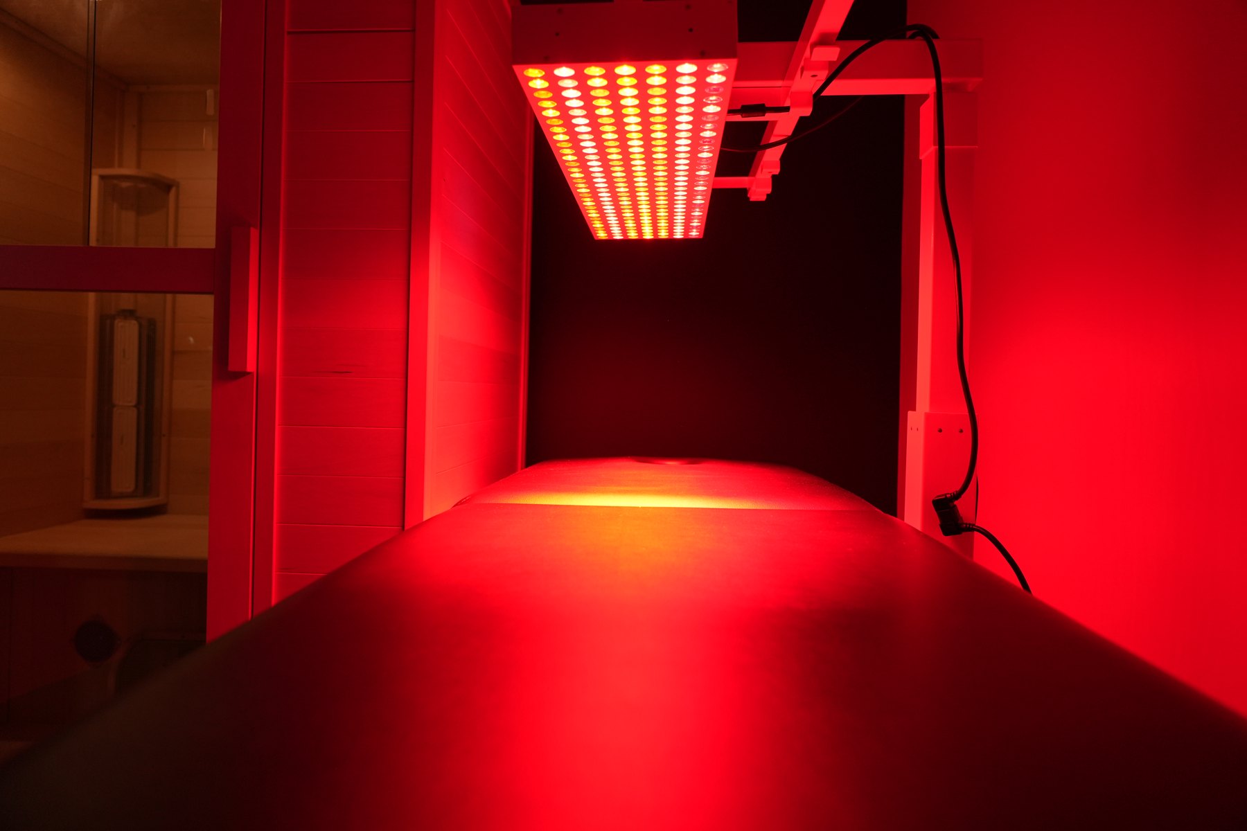 Infraredi red light therapy panel at PRT East York, photographed in the recovery room