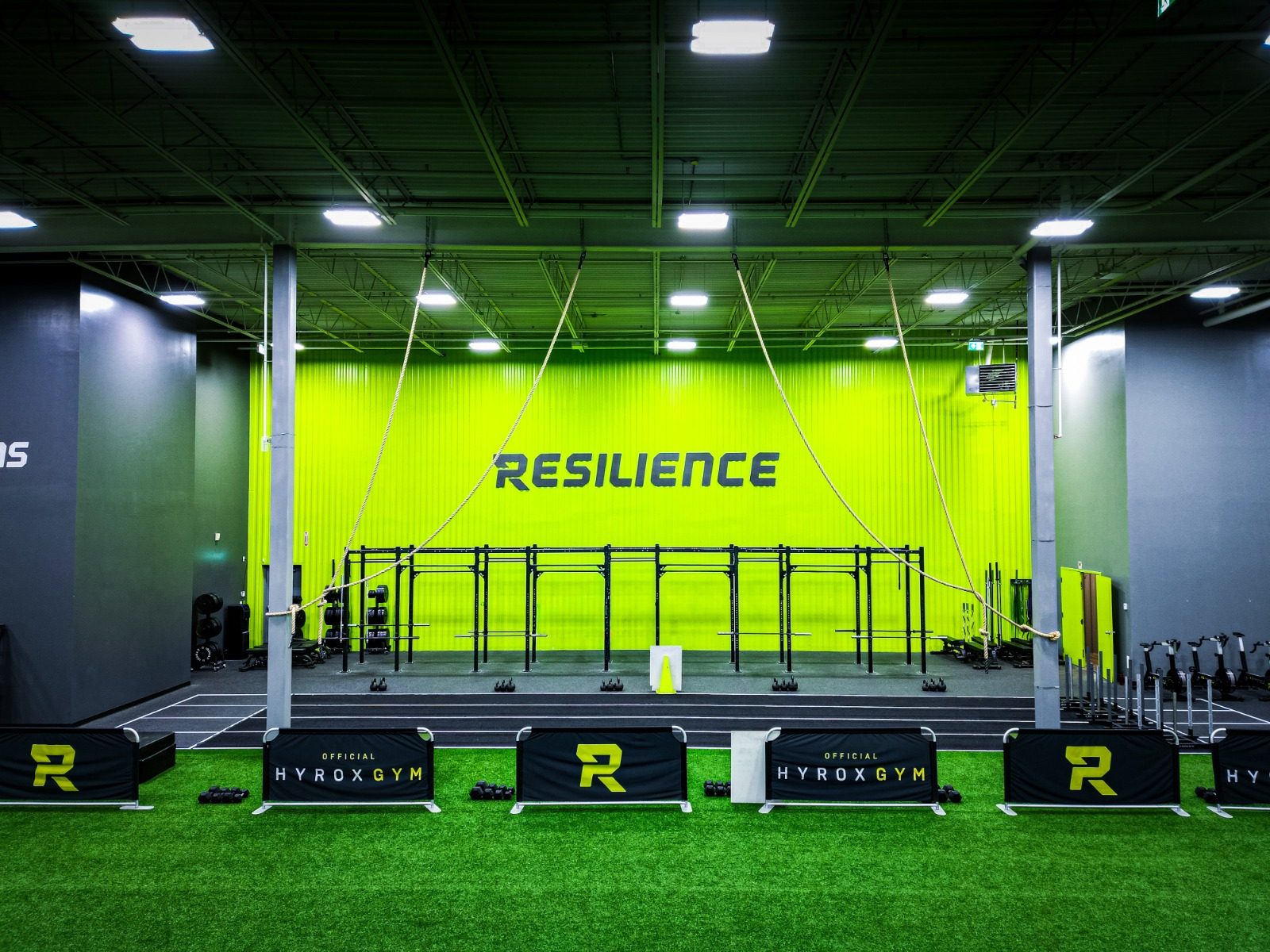 Resilience Fitness training floor at PRT East York — HYROX rig, sled lanes, and turf